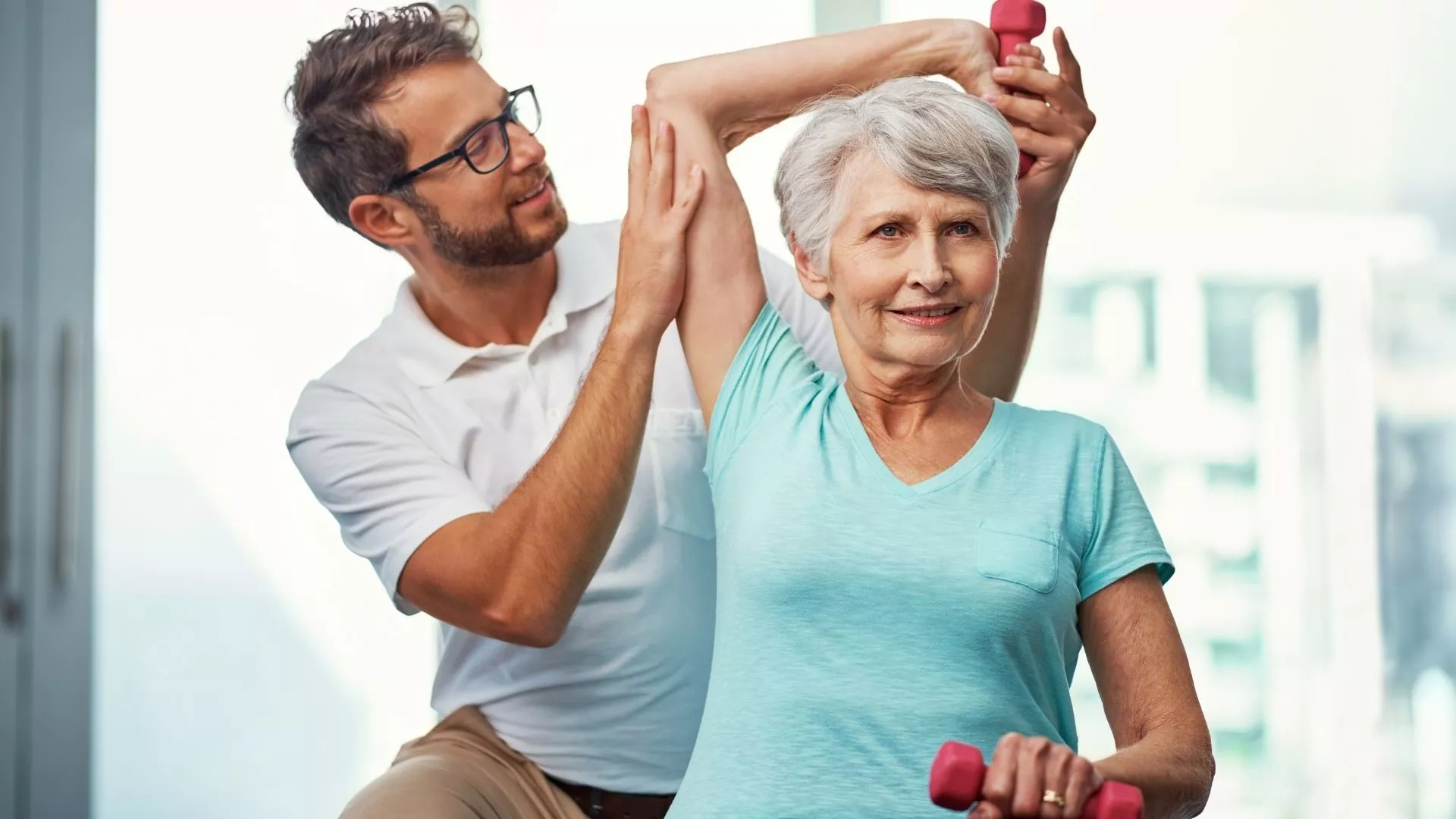 Happy Old Lady Doing Physiotherapy